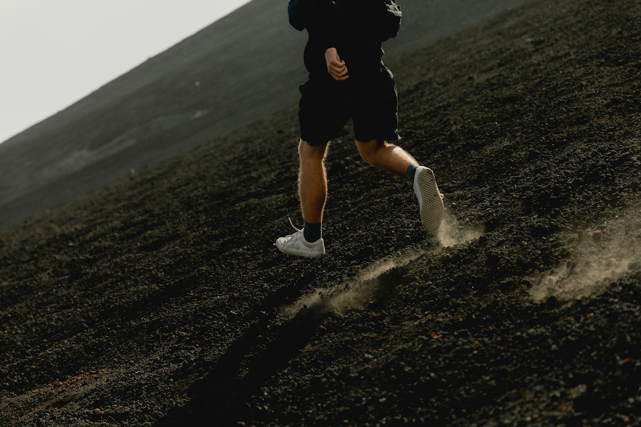 Person running up a hill